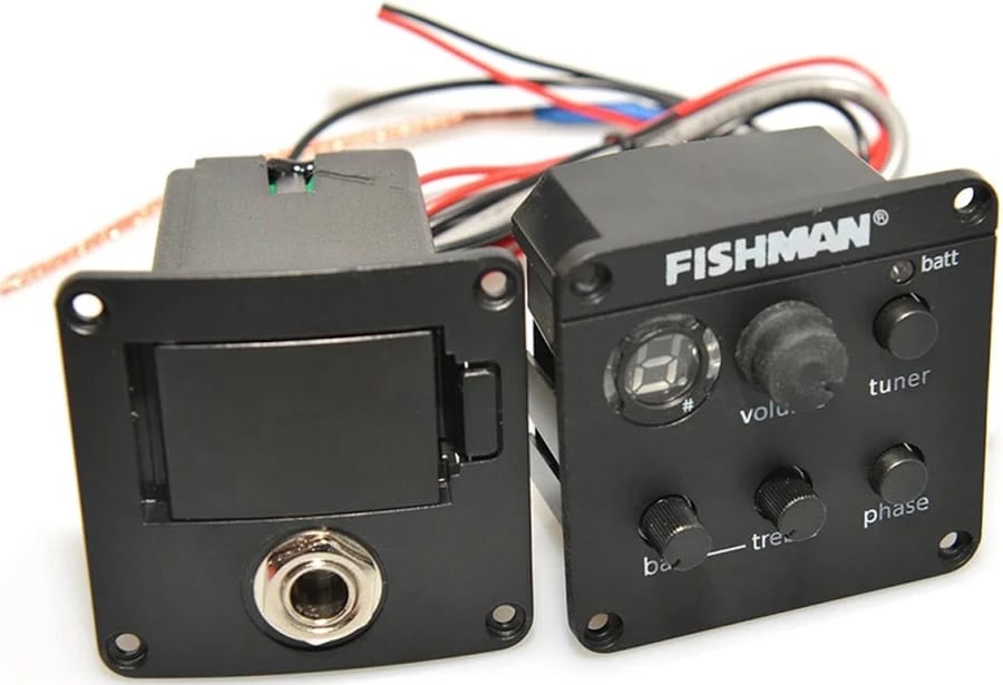 Fishman guitar preamp with battery indicator, tuner, and volume/tone knobs for acoustic-electric setup