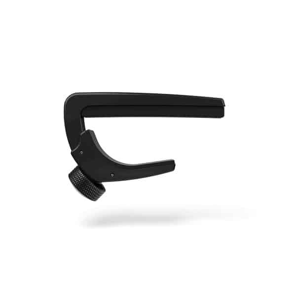 Black guitar capo with knurled adjustment knob, shown in midair with a soft shadow.